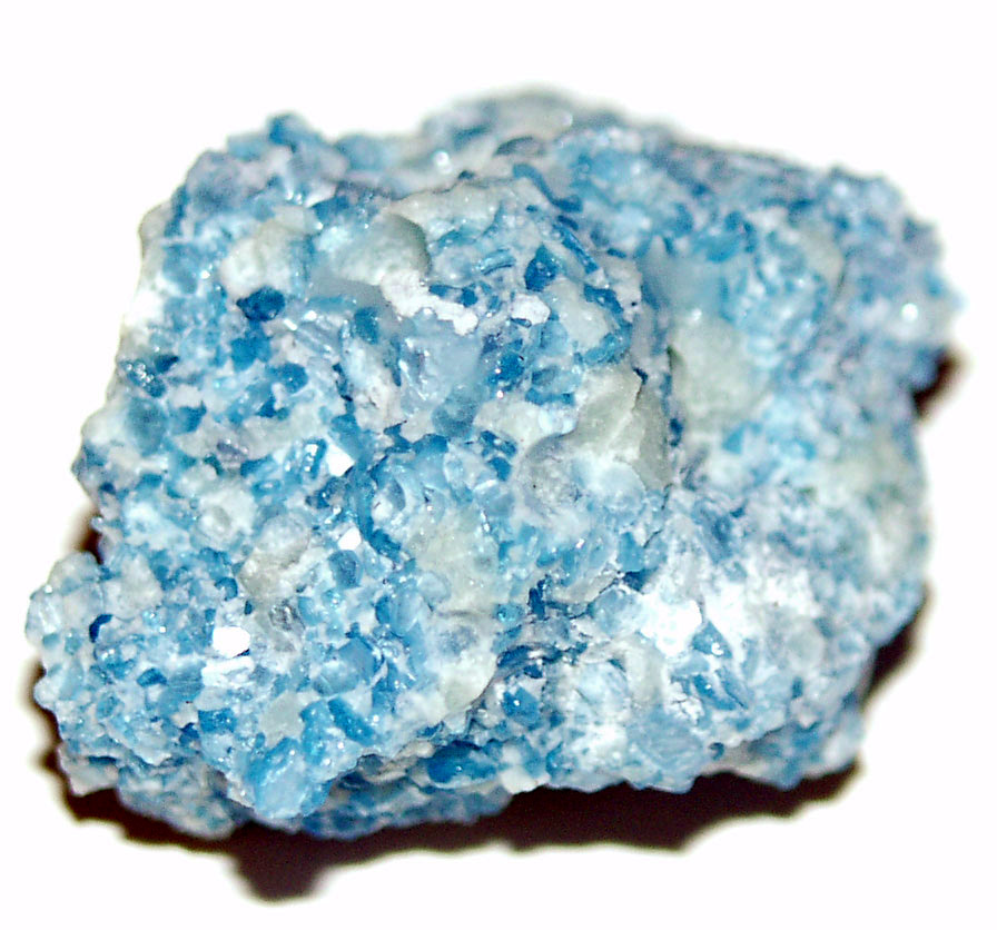 Brucite (in slag)