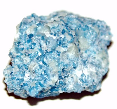 Brucite (in slag)